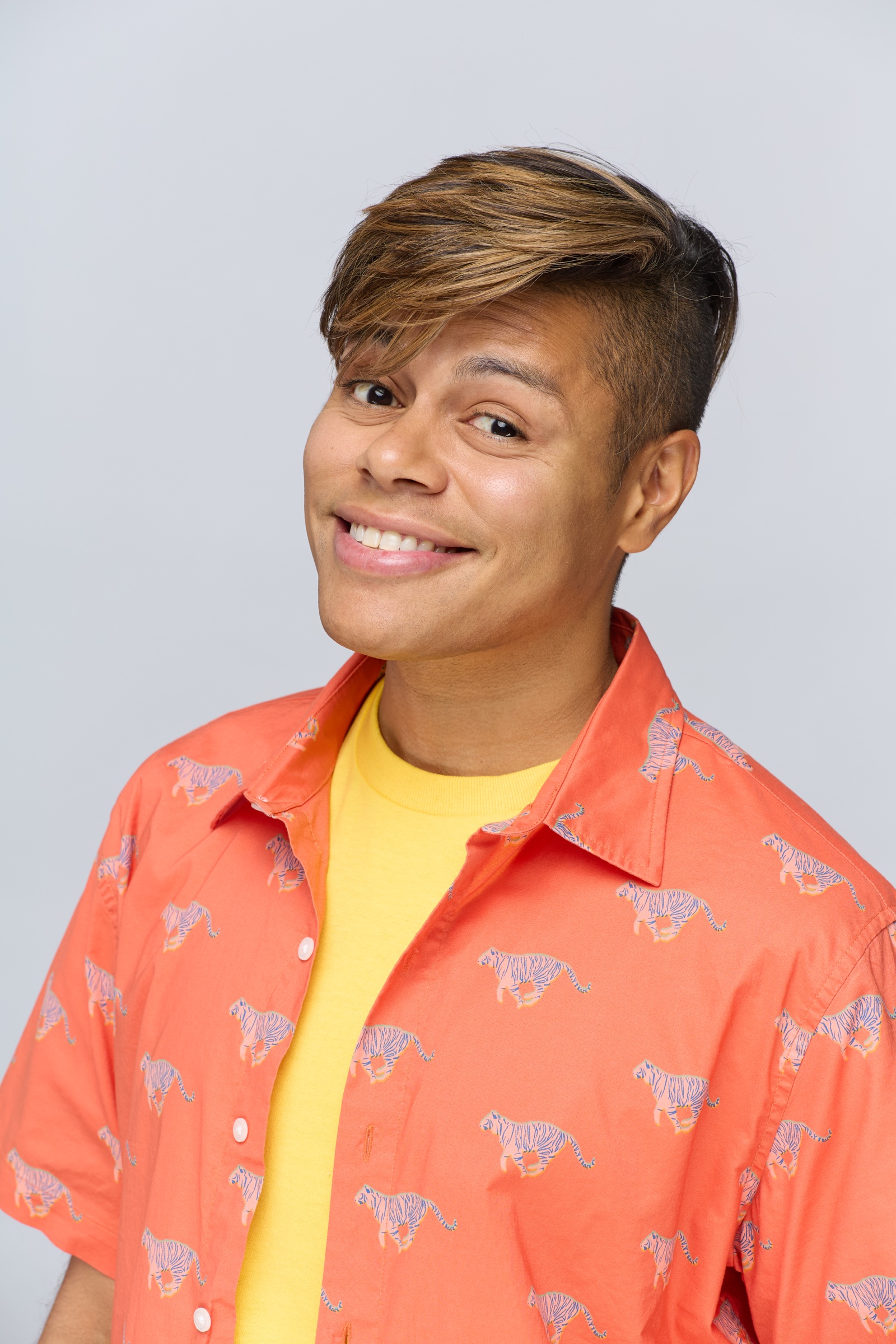 Aaron Stier smiling in a bright commercial headshot